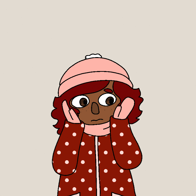 Amada holds her hands to her face. She's changed clothes now - she's wearing a pink hat with matching mittens and scarf, and a red dotted winter coat.