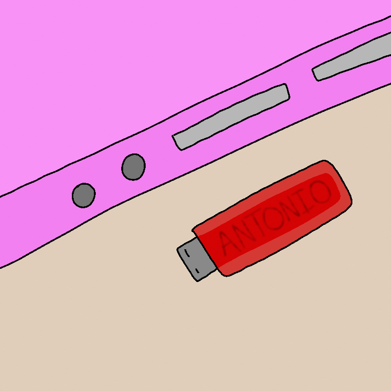 A red USB drive sits next to the pink laptop. Smudged writing on it reads 'ANTONIO'.