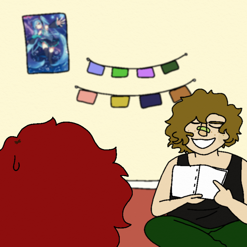 Sofia sits cross-legged on the floor in front of Amada, holding up bud's zine and pointing to a page, looking confident. Amada watches bud talk quietly.