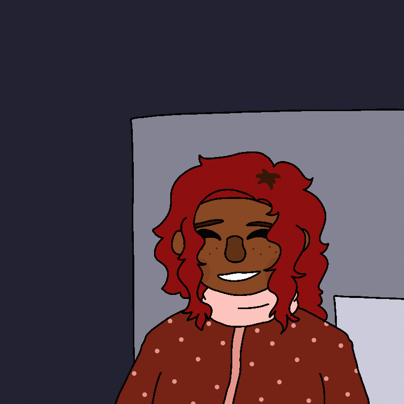 Amada smiling with her eyes closed as she talks.