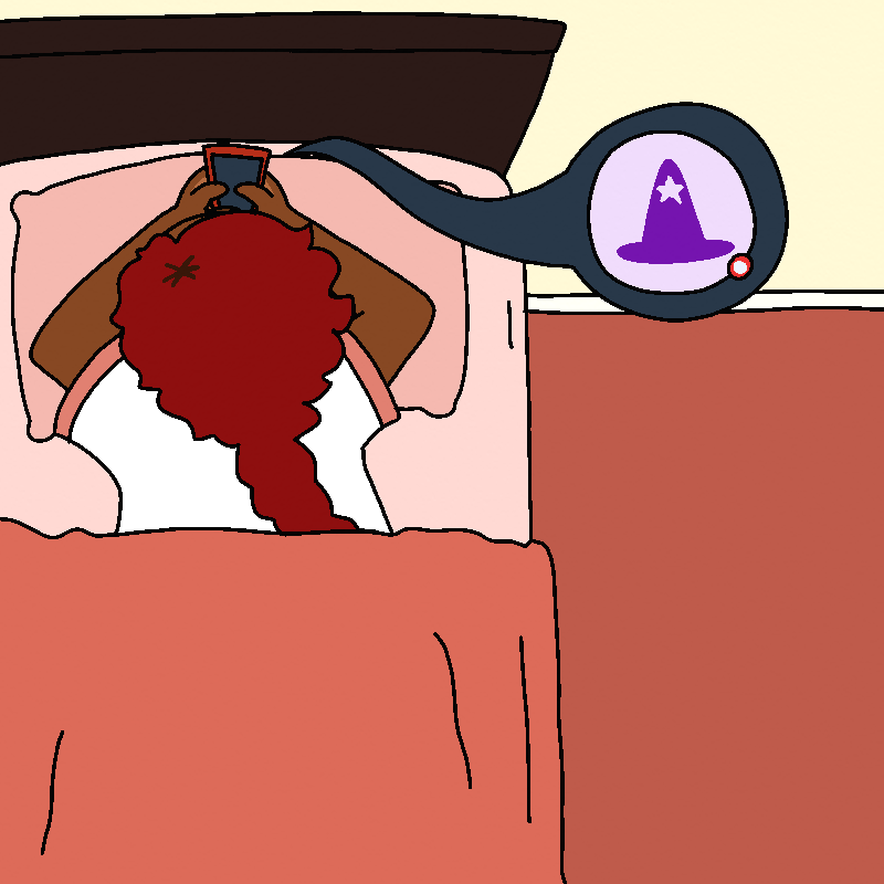 An overhead shot of Amada lying on her stomach in her bed, typing on her phone.
